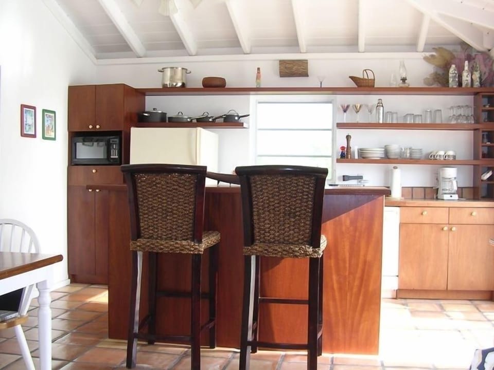 Fully equipped kitchen with Weber gas grill just outdoors