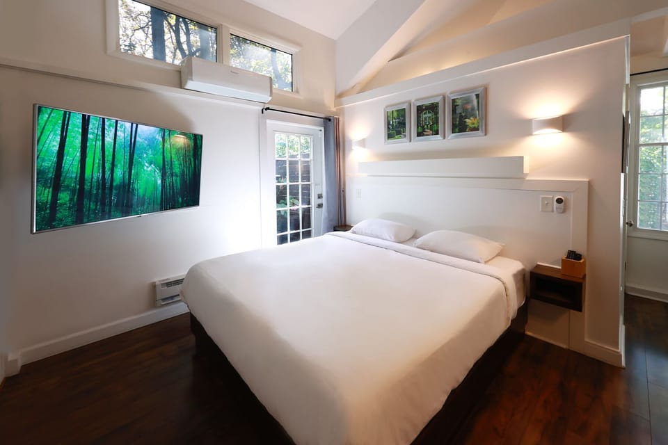 Premium medium-firm 12" thick King size mattress with Tempur-Pedic pillows.