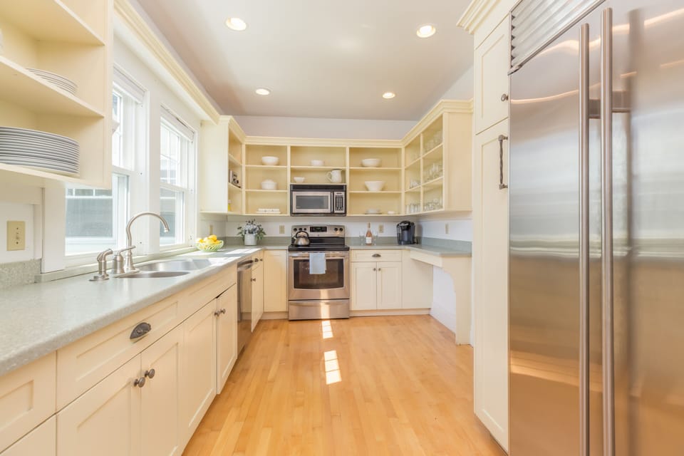 the main kitchen with appliances and 48" sub zero