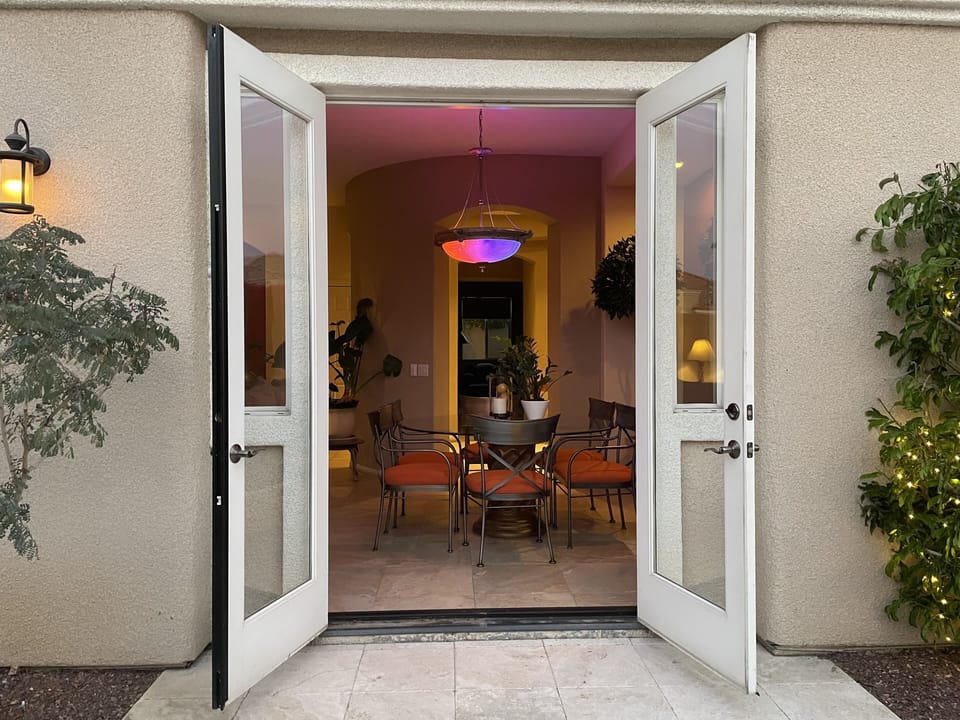 Dining Room with French Doors open to garden 
