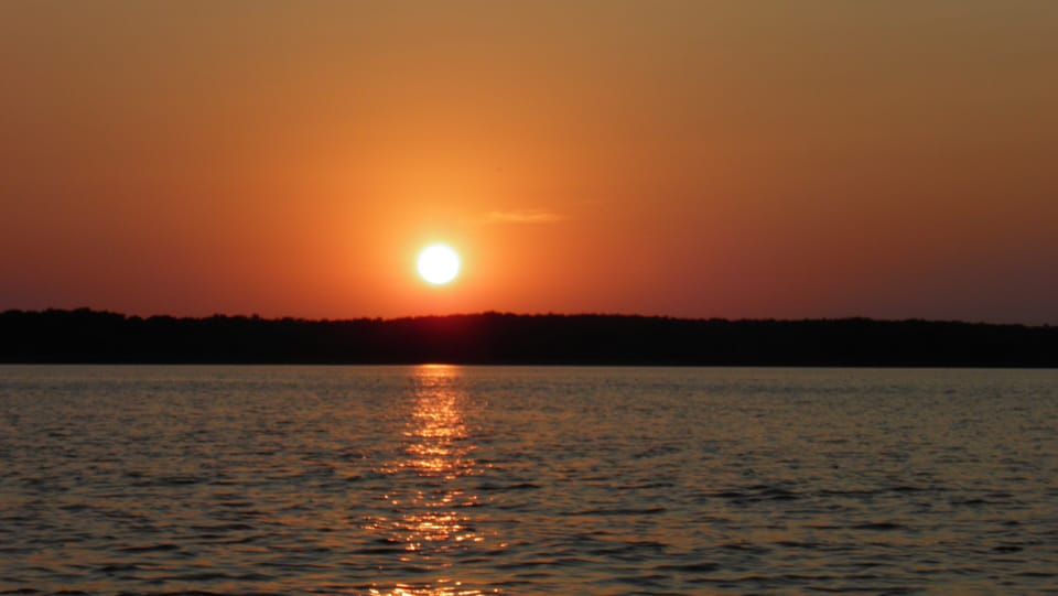 Beautiful Sunset on Partridge Lake while cruising on the pontoon boat.