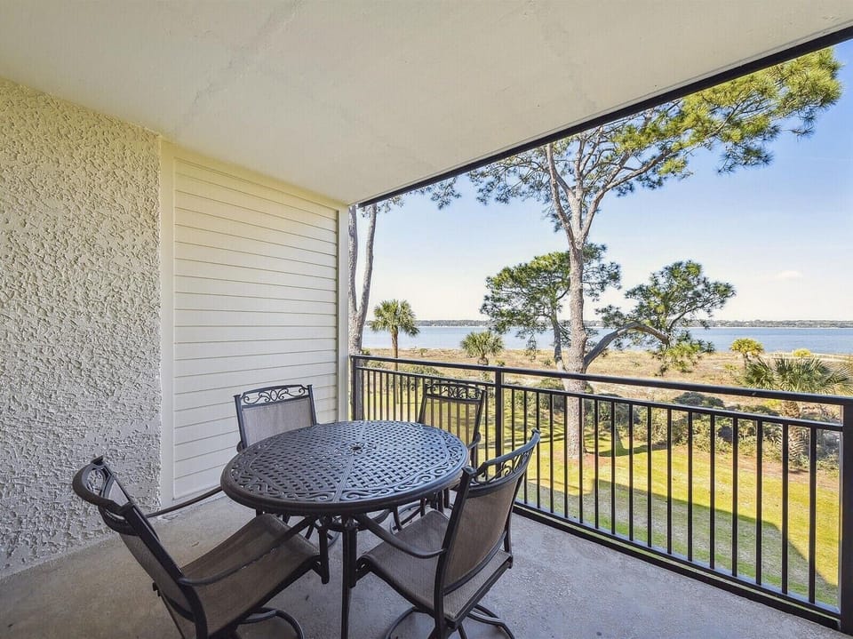 Private 2nd Floor Balcony off Living Room at 1890 Beachside Tennis