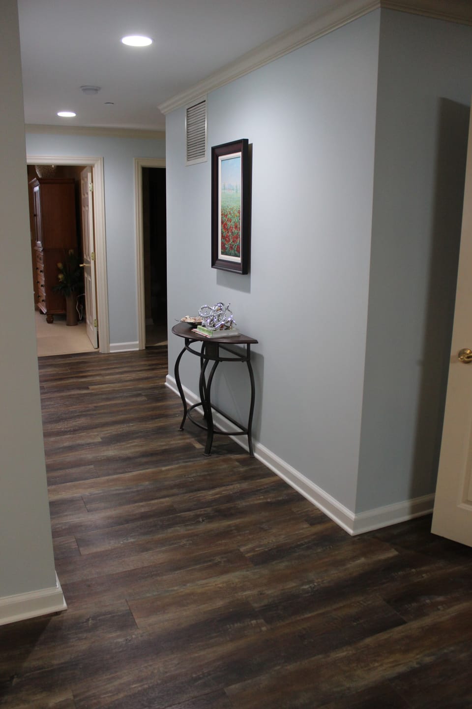 The hallway leading to the two back bedrooms, hallway bath, & master bath in BR2