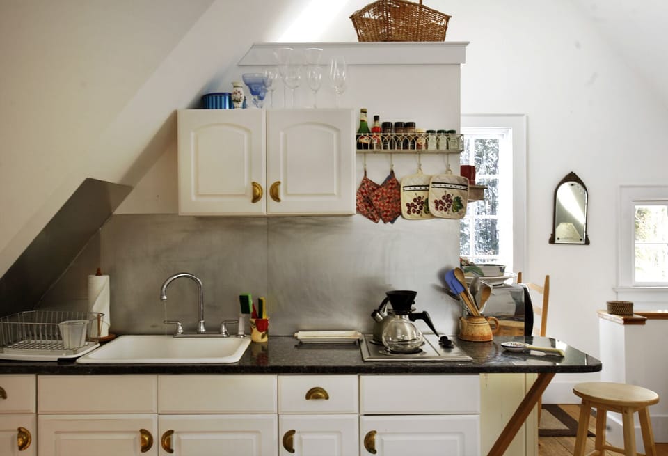Part of kitchen with granite counters