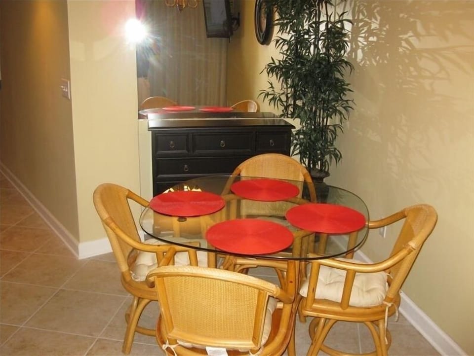 Dining table feature swivel chairs
(4 bar stools at 12 ft. kitchen bar)