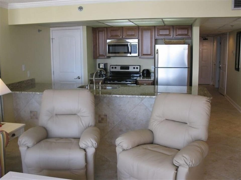 Two lazy boy type recliners with great views of beach and gulf from 4th floor