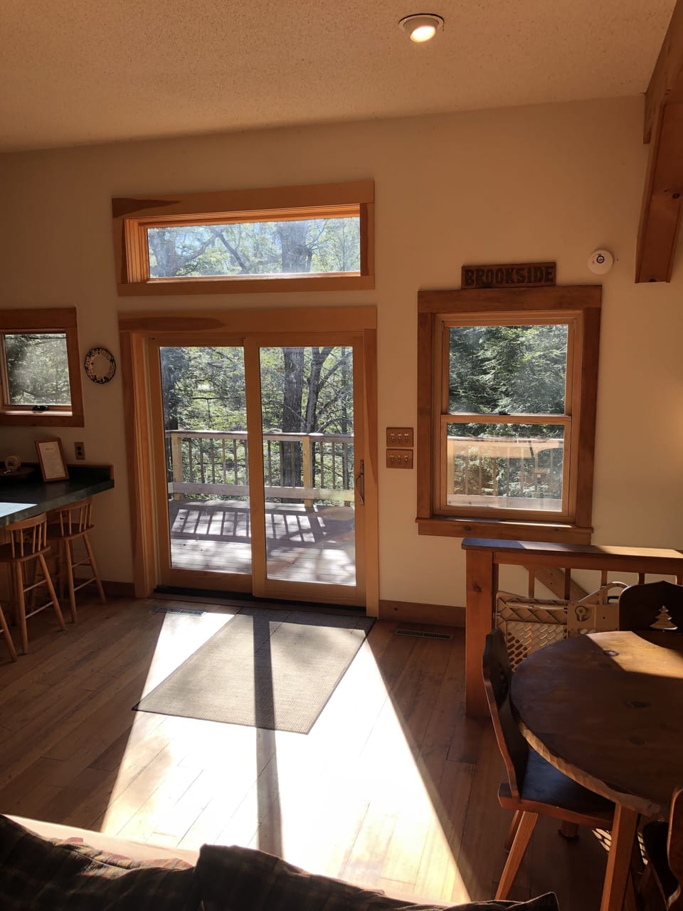 Kitchen sliding door to wrap-around deck