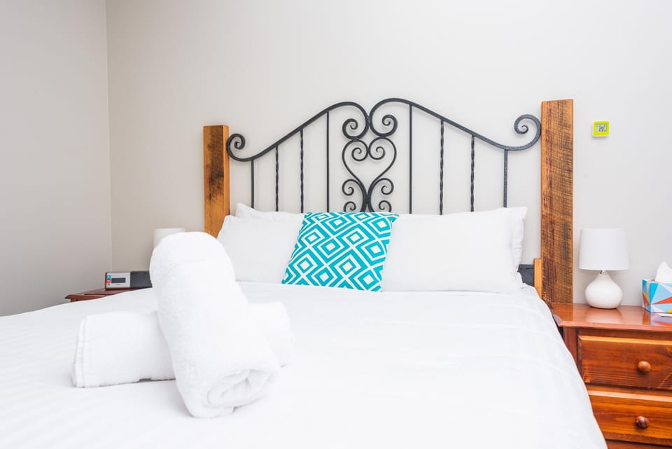 Comfortable and unique beds, with bedheads made from upcycled materials