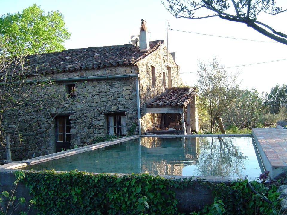 North side of house with pool and sunbathing area, with lovely views all around.