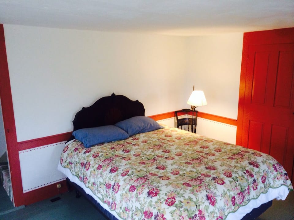 Queen bedroom on first floor with new firm mattresses.