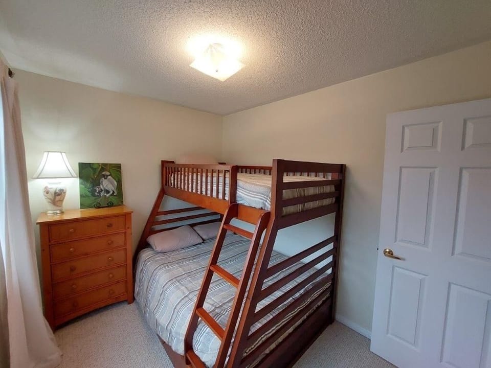 Third bedroom with double and single bunk bed.