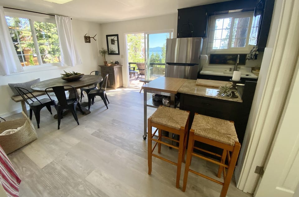 New Stainless steal appliances, kitchen, dinning and laundry area; lake view..