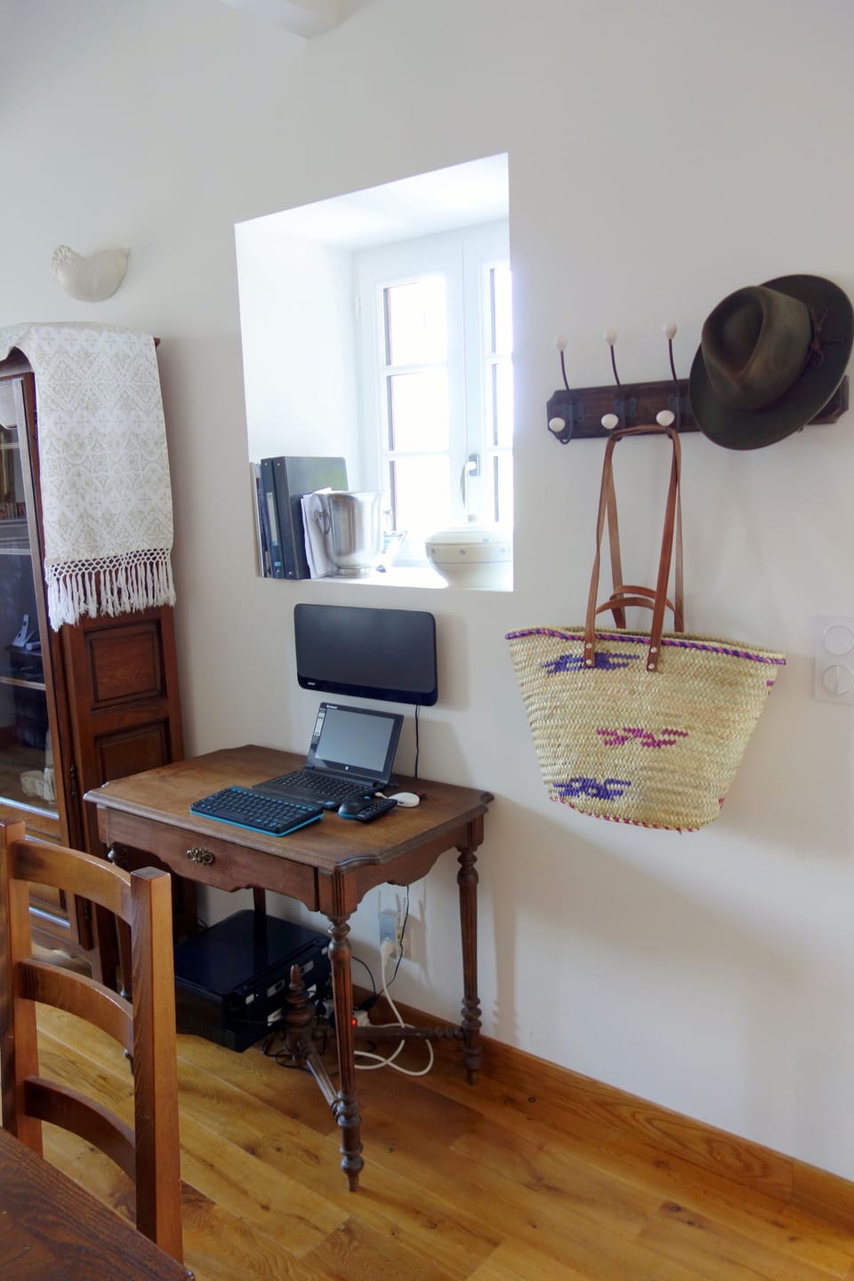 sound system mounted on the wall and the basket is ready for a market trip