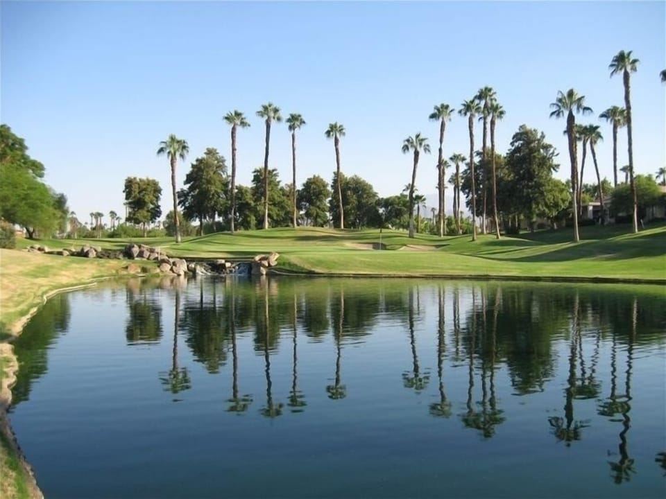 View From Patio includes golf course, mountain and water views.

