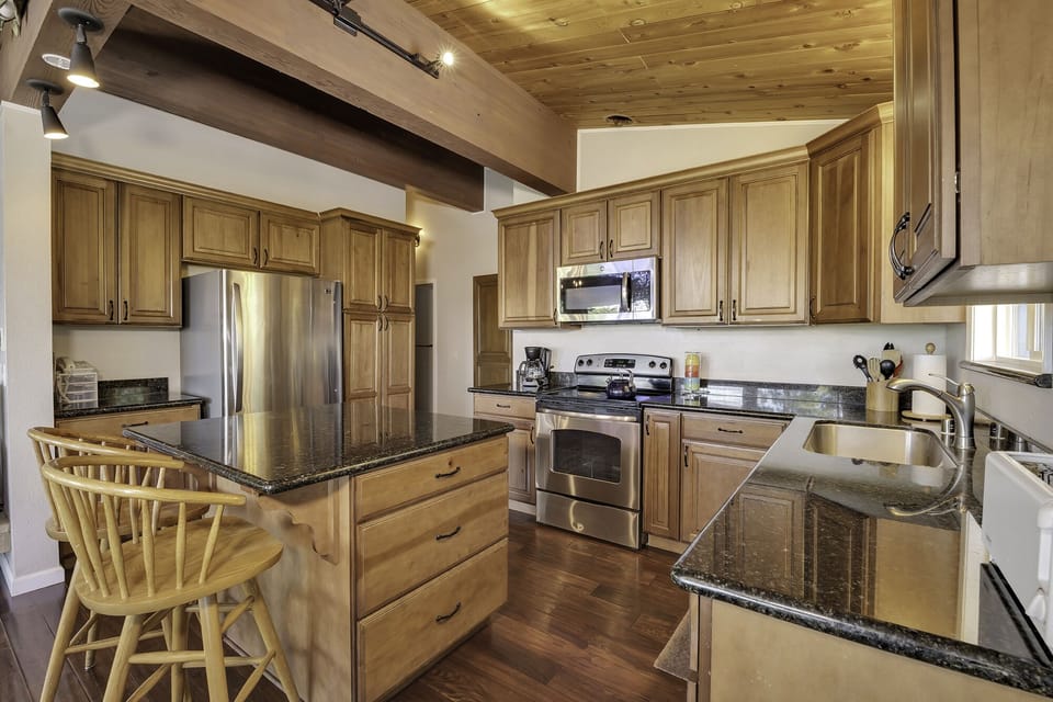 Gourmet kitchen with prep island, tons of cabinet and counter space.