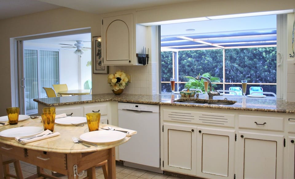 Kitchen pass-through to pool side counter