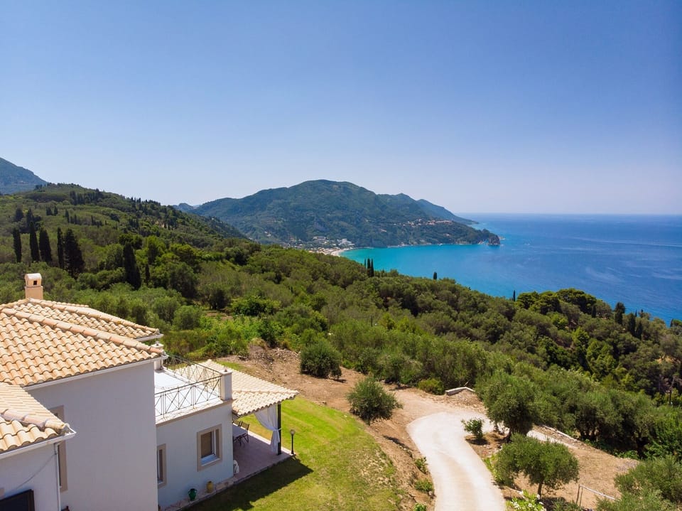 The villa looking the famous sandy beach of Agios Gordios 