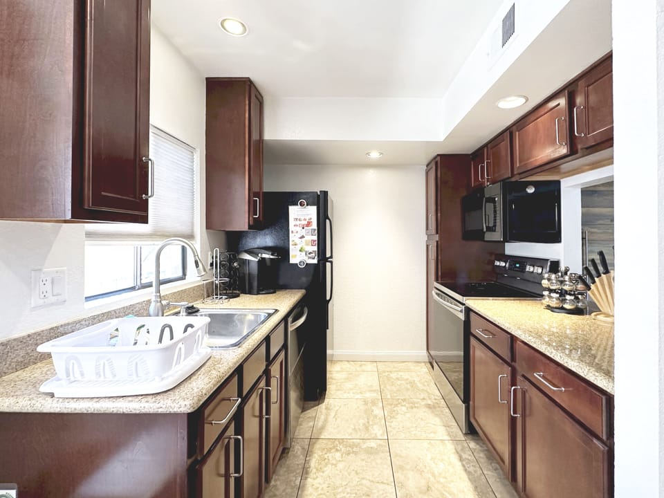 Oven, range, dishwasher, microwave, refridgerator, freezer, garbage disposal.