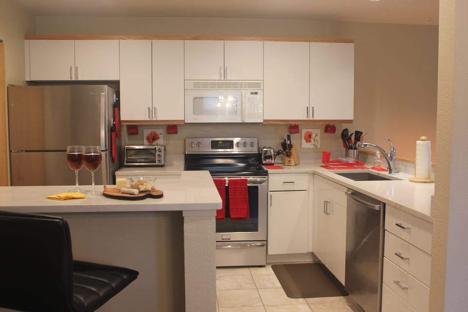 Newly remodeled kitchen is open to dining and living room. 