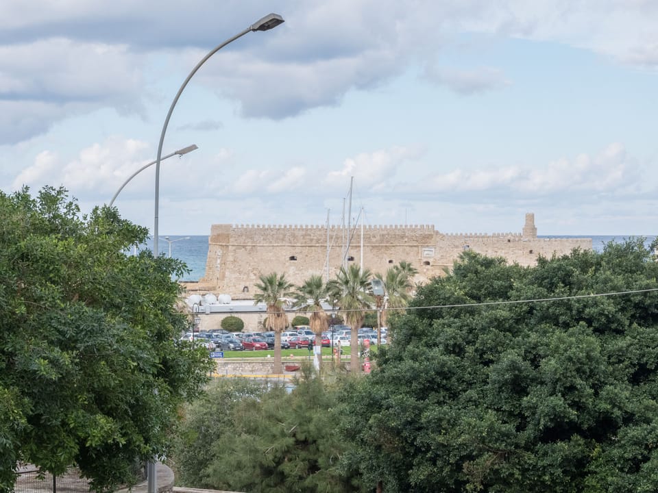 Living room balcony view of "Koules" the Venetian fortress in the old port