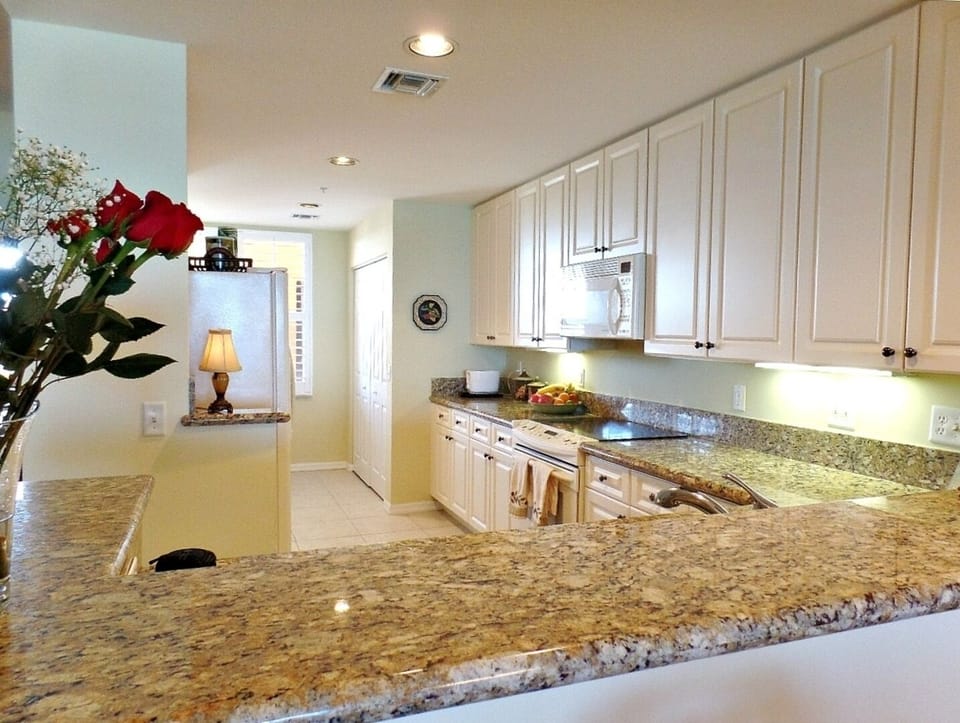 Fully equipped kitchen with new granite countertops and every convenience.