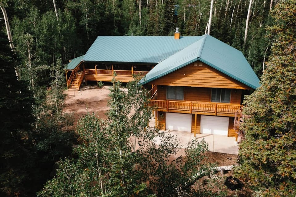 Fir Street surrounded by trees in mountain paradise