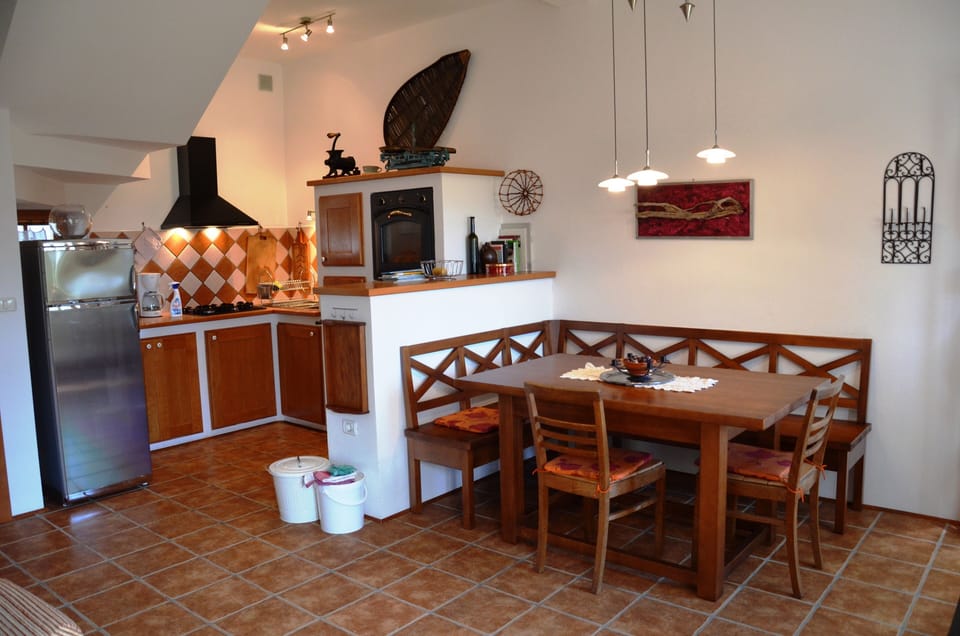 Built kitchen with dining room