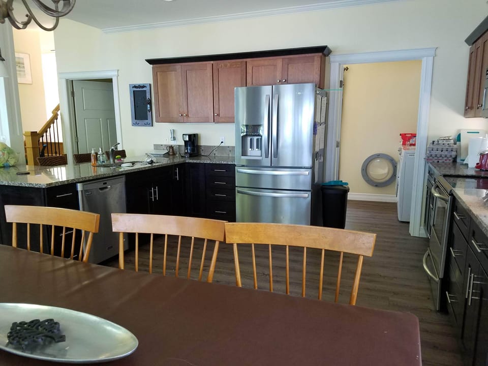 Kitchen facing the laundry room.