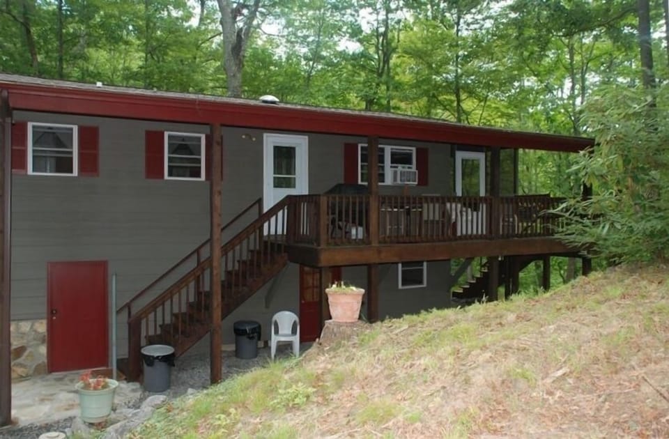 Relax on the open side porch or the front screened in porch