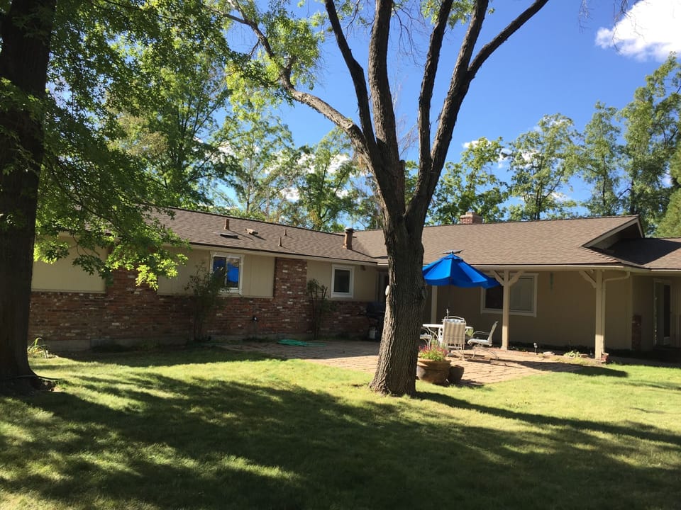 Exterior view 3 view from backyard toward front door.
