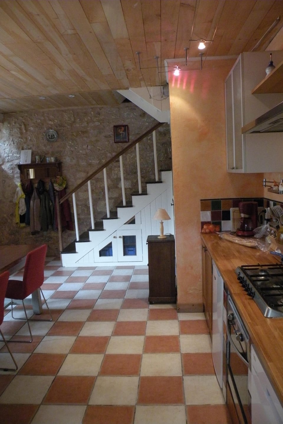 The kitchen stairs lead to the salon on the first floor.