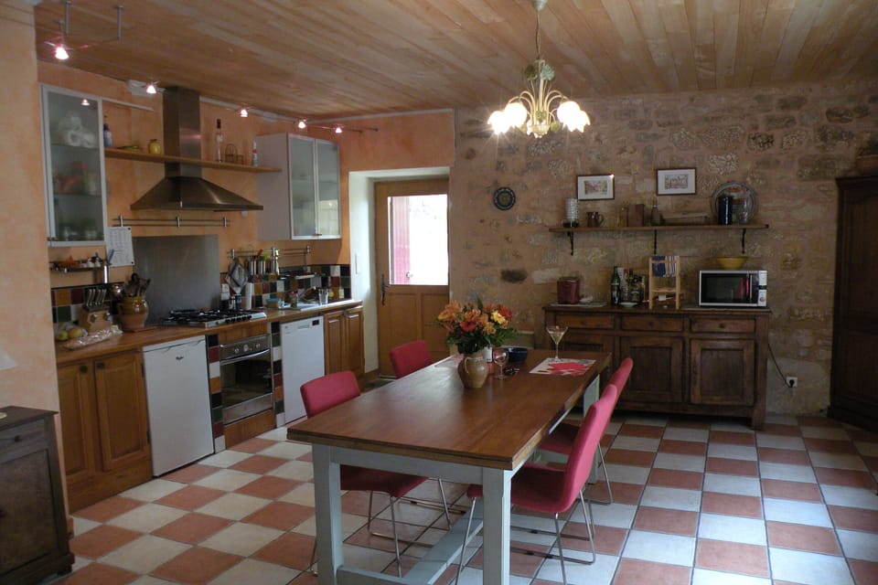 The spacious kitchen has all the amenities and a new fridge and dishwasher too!