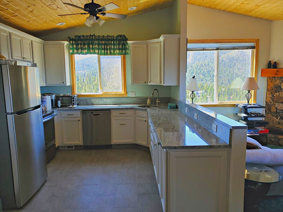 Updated kitchen with slope and lake views