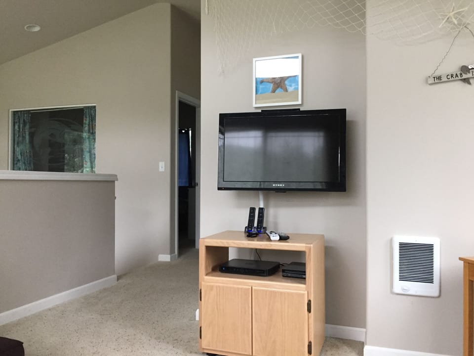 Loft view from couch. Queen bedroom in the background.