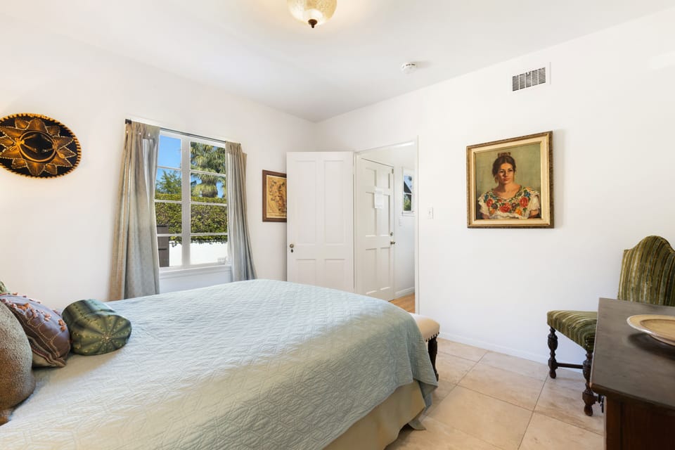 Queen bedroom decorated in 1937 early California style