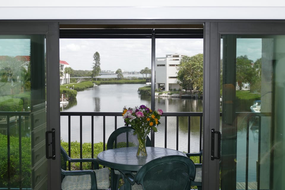 Access the Lanai & take in beautiful views of the inter-coastal from the master