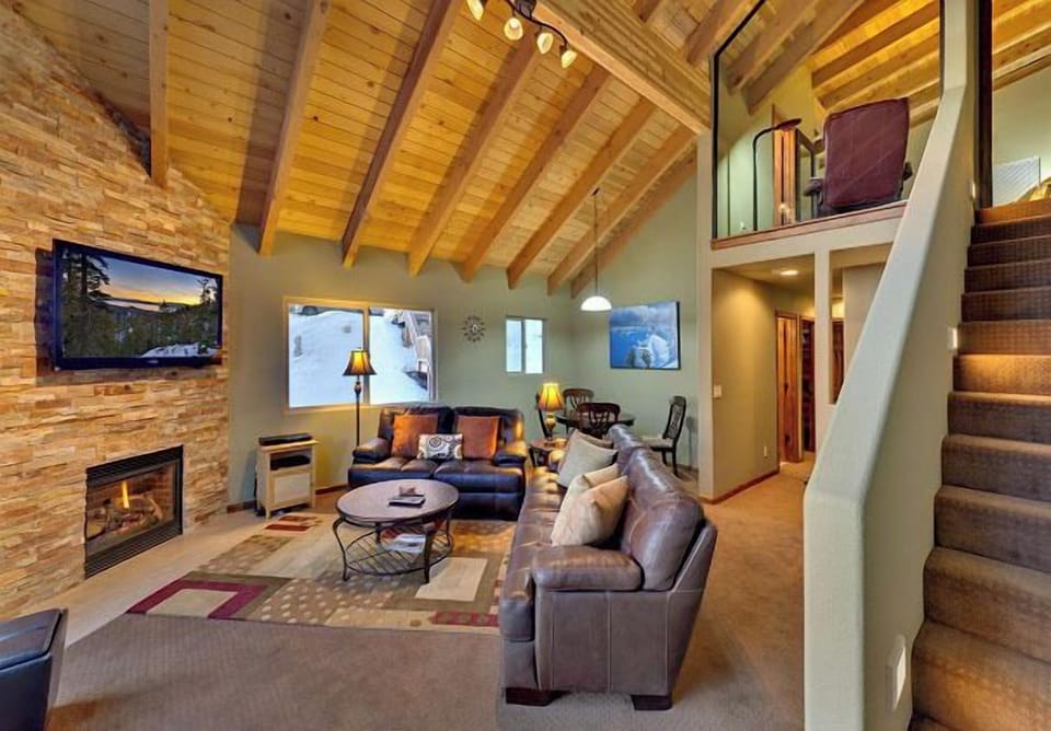 2nd Floor Den: Vaulted ceilings with exposed natural wood. Stairs to loft MBR #2
