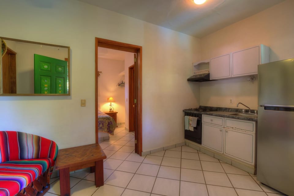 Vaquero's living room and kitchen.
