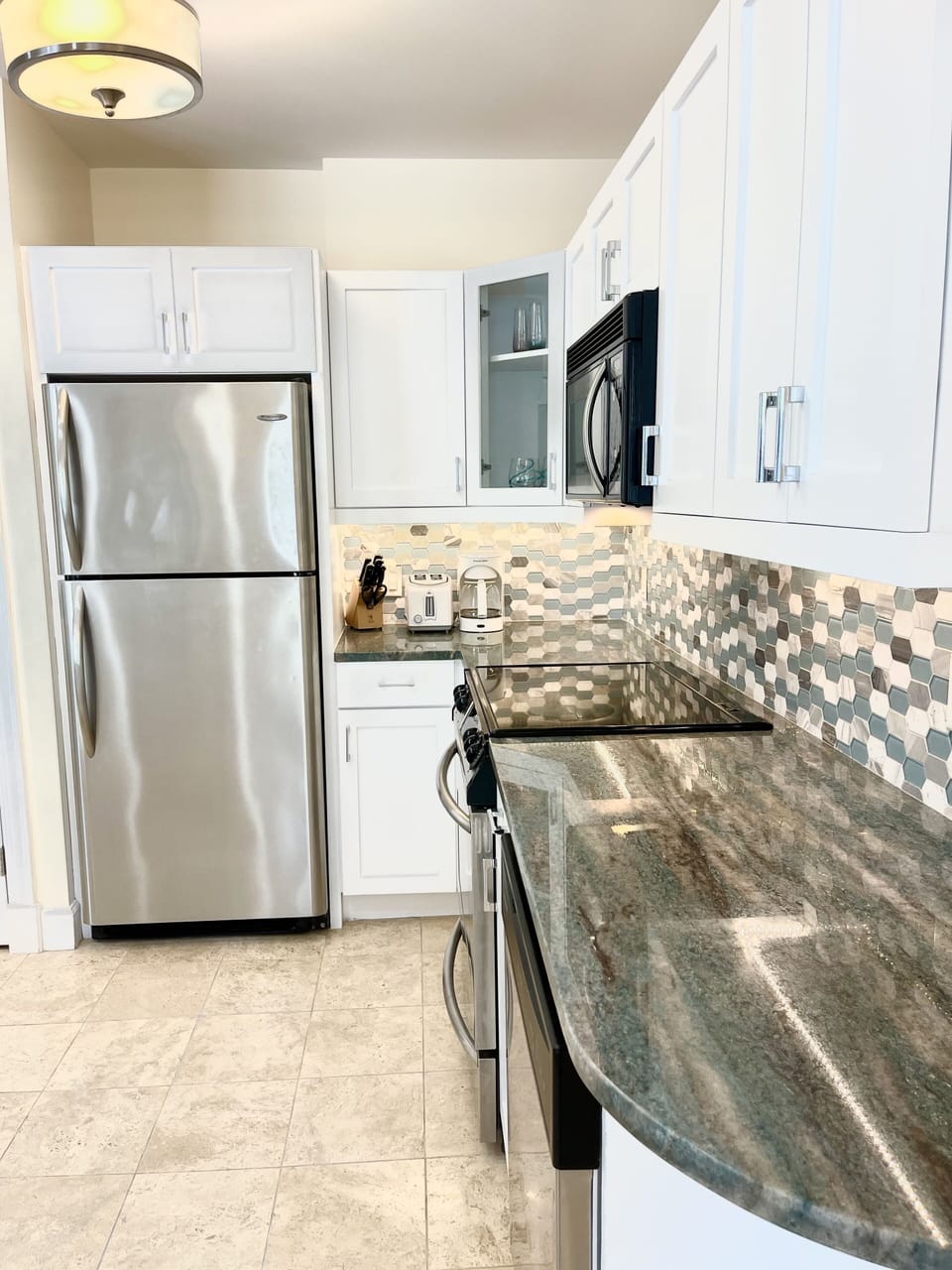 Bright new granite countertops and new backsplash
