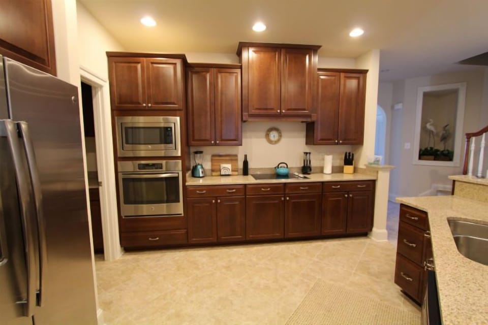 Kitchen, featuring Granite counter tops & stainless steel appliances