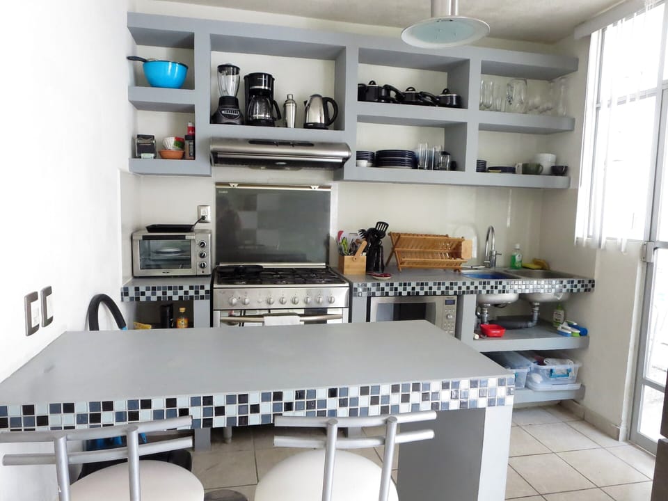 Kitchen full of the amenities of home