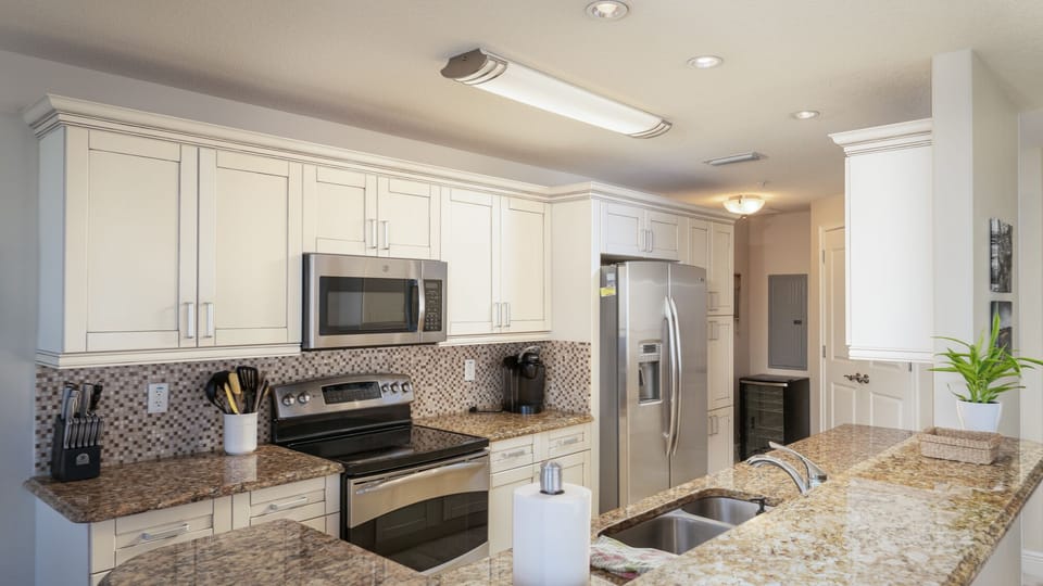 Kitchen with built in microwave, wine fridge and trash chute, no trash runs!