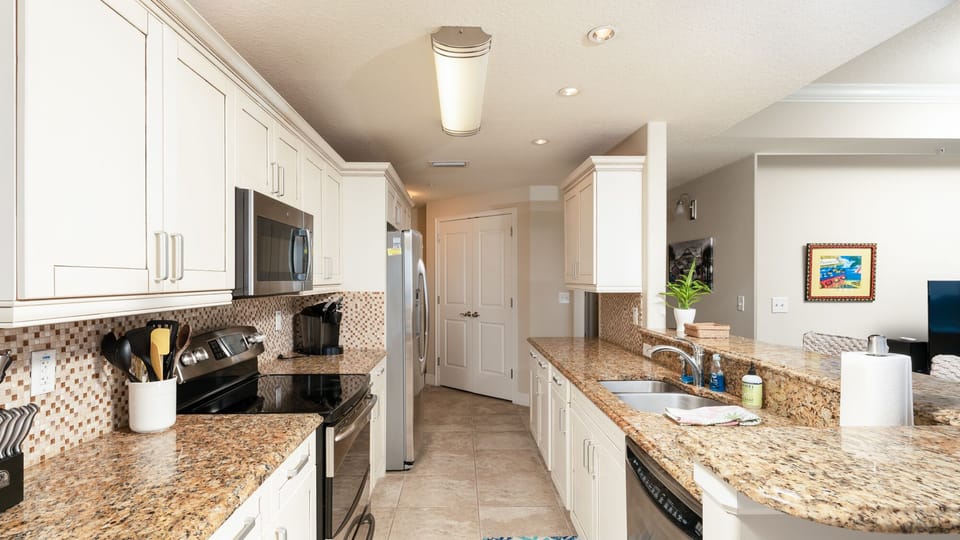 Open kitchen with bar seating so the whole family can enjoy!