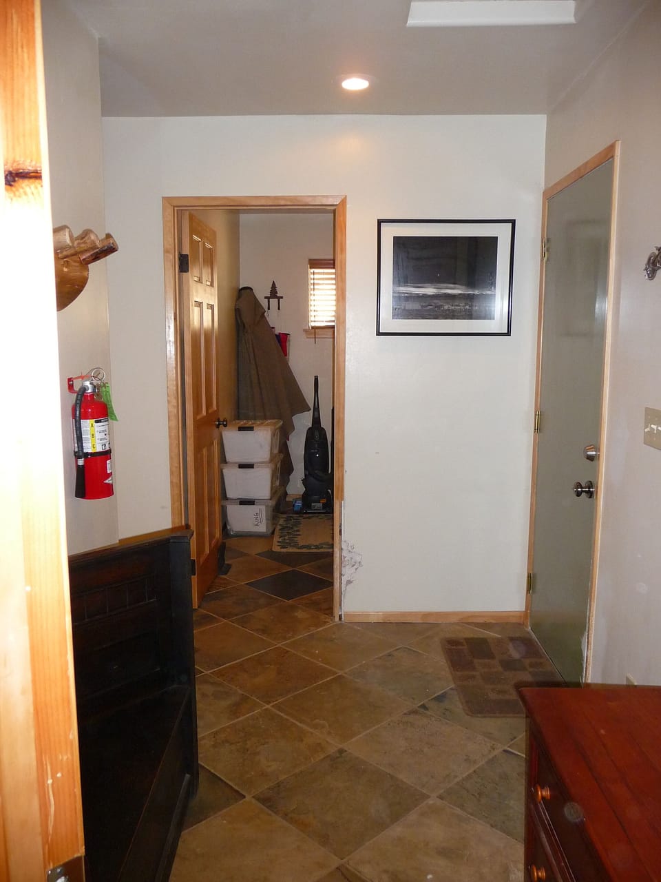Mud Room... (looking into full-sized washer and dryer)...