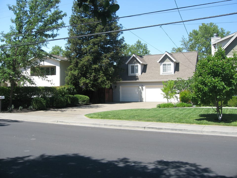 Front of property.  Apartment is over the garage.