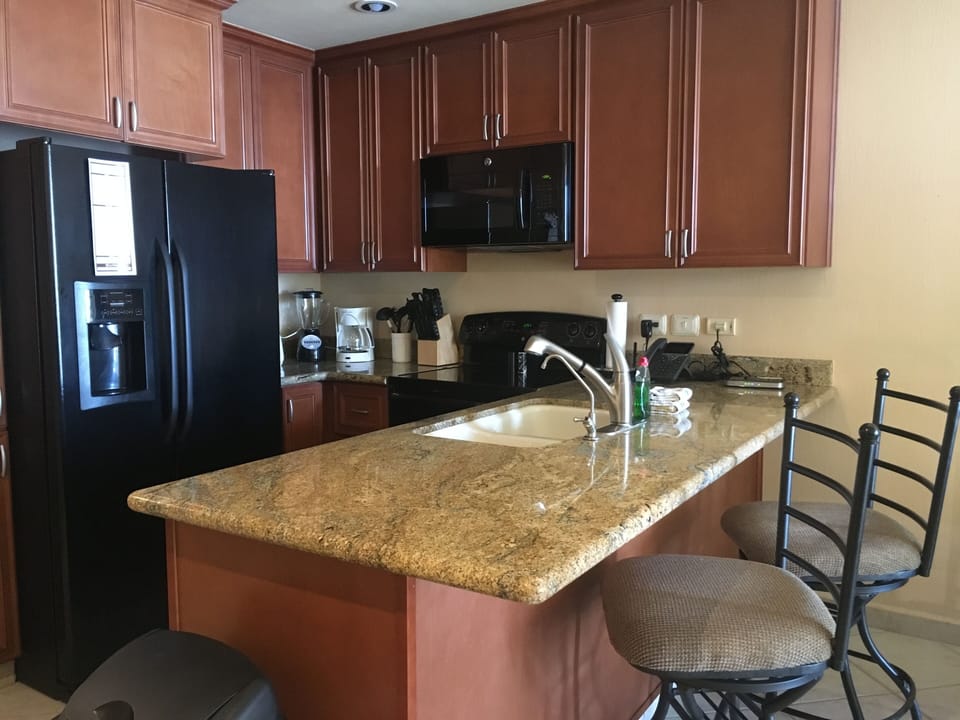 full kitchen with all the cooking and eating utensils