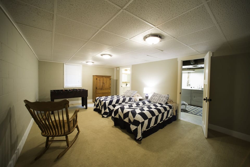 Basement Rec room with foosball table and kids games/toys