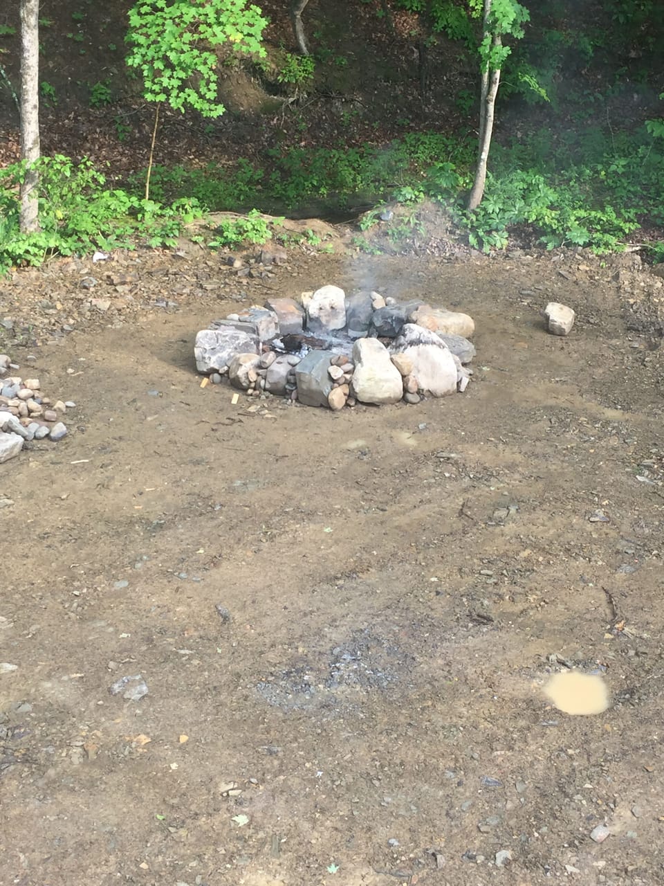Fire ring w creek right behind it!