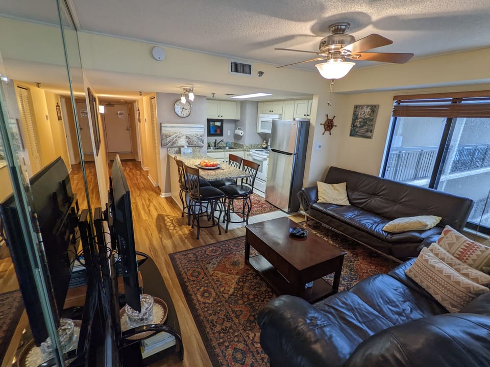 The hallway from the entry door to the living room