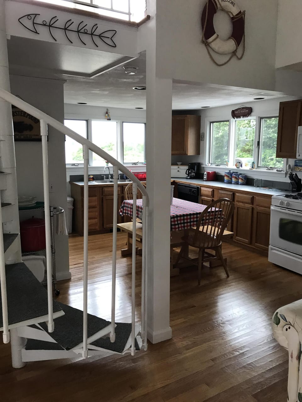 Kitchen & Spiral Staircase Leading to Second Floor